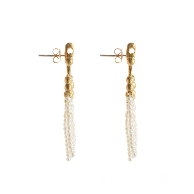 Crotalia Crucifix - Gold cross-shaped earrings with pearl tassel details seen from the side.